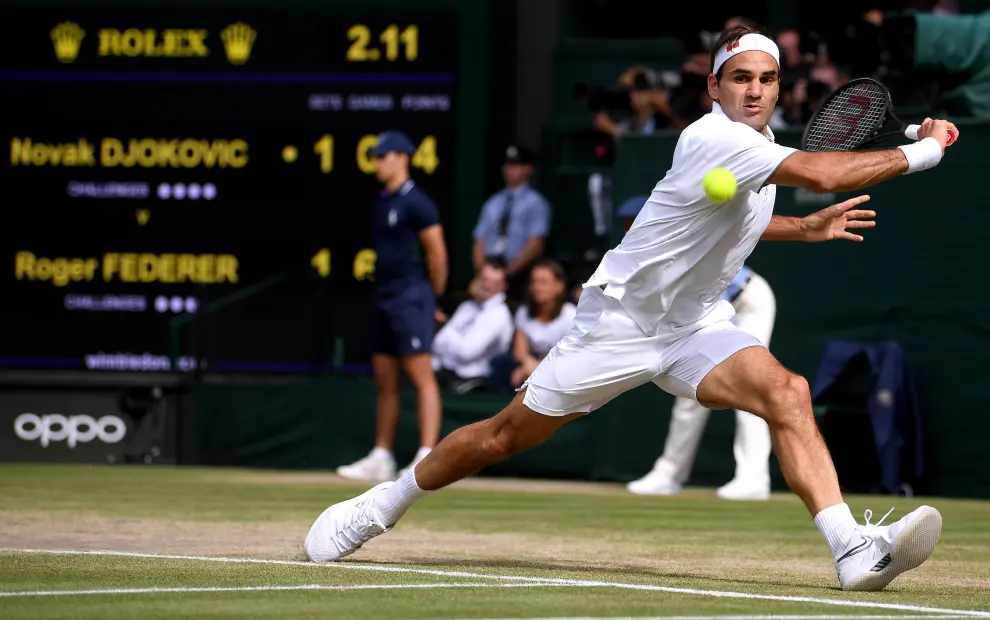 Wimbledon (United Kingdom), 14/07/2019.- Novak Djokovic of Serbia in action against Roger Federer of Switzerland during their Men's final match for the Wimbledon Championships at the All England Lawn Tennis Club, in London, Britain, 14 July 2019. (Tenis, Suiza, Reino Unido, Londres) EFE/EPA/ADRIAN DENNIS / POOL EDITORIAL USE ONLY/NO COMMERCIAL SALES Wimbledon Championships