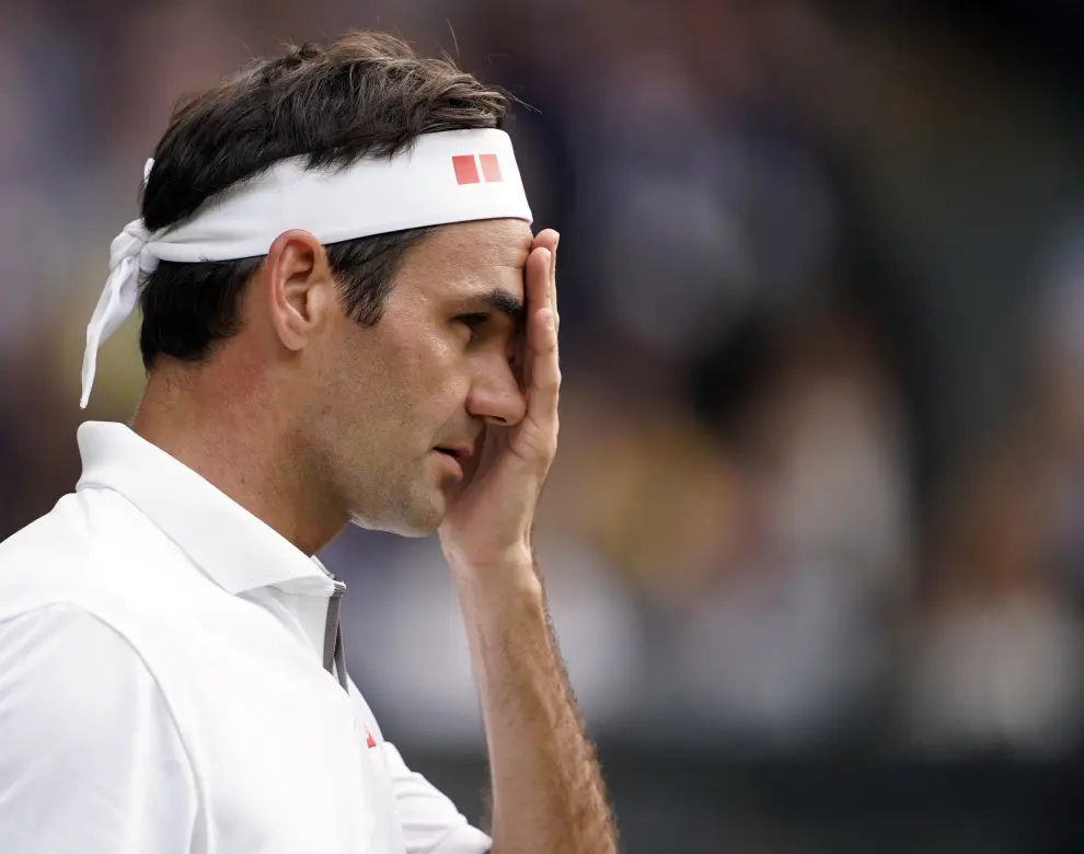 Wimbledon (United Kingdom), 14/07/2019.- Roger Federer of Switzerland in action against Novak Djokovic of Serbia during their Men's final match for the Wimbledon Championships at the All England Lawn Tennis Club, in London, Britain, 14 July 2019. (Tenis, Suiza, Reino Unido, Londres) EFE/EPA/Laurence Griffiths / POOL EDITORIAL USE ONLY/NO COMMERCIAL SALES *** Local Caption *** LONDON, ENGLAND - JULY 13: Serena Williams of The United States and Simona Halep of Romania embrace after their Ladies' Singles final during Day twelve of The Championships - Wimbledon 2019 at All England Lawn Tennis and Croquet Club on July 13, 2019 in Lo Wimbledon Championships