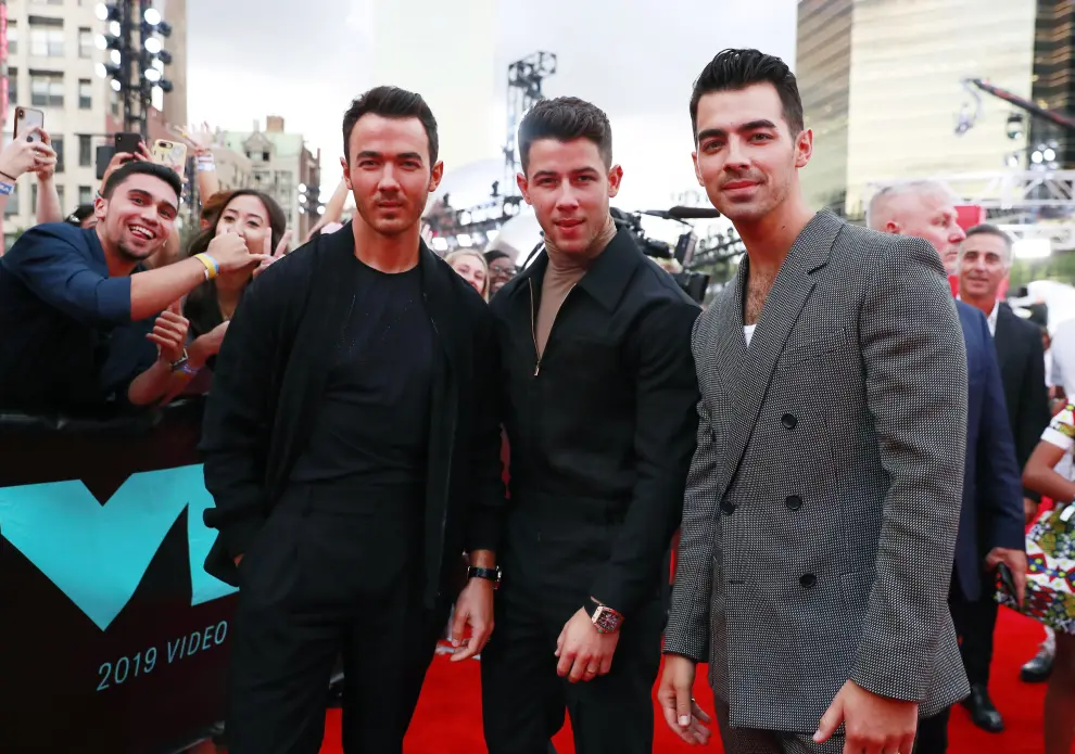 2019 MTV Video Music Awards - Arrivals - Prudential Center, Newark, New Jersey, U.S., August 26, 2019 - Jonas Brothers. REUTERS/Andrew Kelly [[[REUTERS VOCENTO]]] AWARDS-VMA/