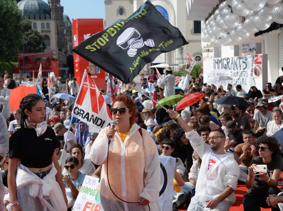 Venice (Italy), 07/09/2019.- Climate and migration protesters occupy the red carpet of the 76th annual Venice International Film Festival, in Venice, Italy, 07 September 2019. The festival runs from 28 August to 07 September. (Protestas, Cine, Italia, Niza, Venecia) EFE/EPA/ANDREA MEROLA Protest - 76th Venice Film Festival
