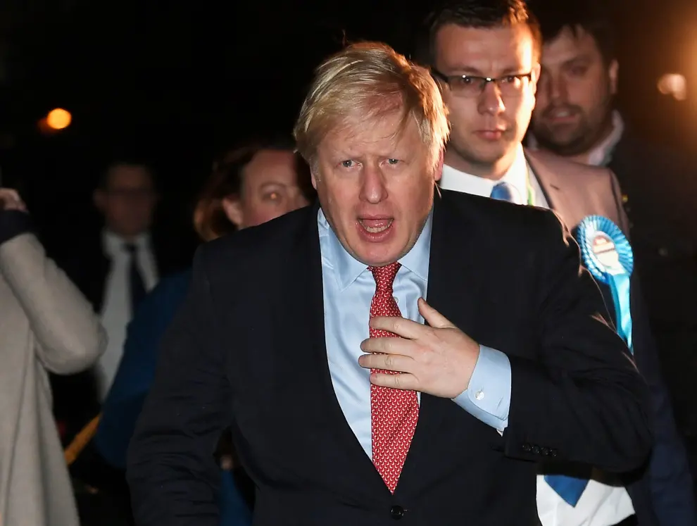 British Prime Minister Boris Johnson and Carrie Symonds arrive at the counting centre in Britain's general election in Uxbridge, Britain, December 13, 2019. REUTERS/Toby Melville [[[REUTERS VOCENTO]]] BRITAIN-ELECTION/