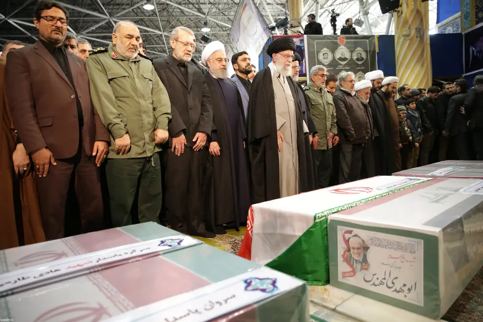 Brigadier General Esmail Ghaani, the newly appointed commander of the country's Quds Force, kisses a coffin during the funeral prayer over the coffins of Iranian Major-General Qassem Soleimani, head of the elite Quds Force, and Iraqi militia commander Abu Mahdi al-Muhandis, who were killed in an air strike at Baghdad airport, in Tehran, Iran January 6, 2020. Official Khamenei website/Handout via REUTERS ATTENTION EDITORS - THIS IMAGE WAS PROVIDED BY A THIRD PARTY. NO RESALES. NO ARCHIVES [[[REUTERS VOCENTO]]]