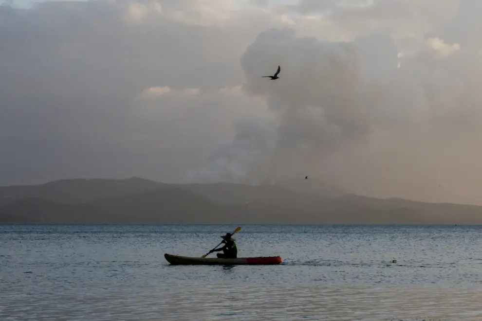 Inflatables floating on Taal Lake are covered with volcanic ash in a resort near the erupting Taal Volcano in Talisay, Batangas, Philippines, January 14, 2020. REUTERS/Eloisa Lopez [[[REUTERS VOCENTO]]] PHILIPPINES-VOLCANO/TAAL