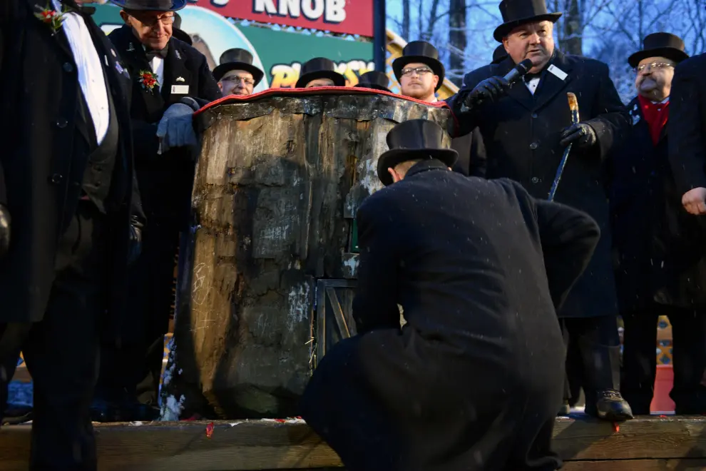 Punxsutawney Phil's co-handler John Griffiths holds the famous groundhog on the 134th Groundhog Day at Gobblers Knob in Punxsutawney, Pennsylvania, U.S., February 2, 2020. REUTERS/Alan Freed [[[REUTERS VOCENTO]]] USA-GROUNDHOGDAY/