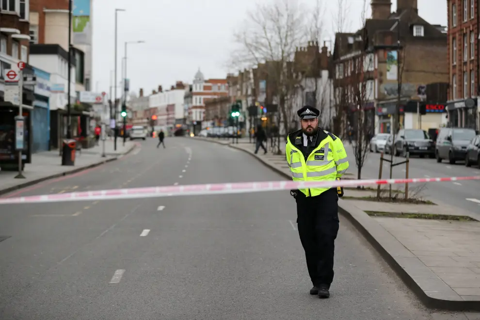A police officer is seen near a site where a man was shot by armed officers in Streatham, south London, Britain, February 2, 2020. REUTERS/Antonio Bronic [[[REUTERS VOCENTO]]] BRITAIN-SECURITY/