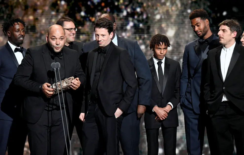 Cast members celebrate on the stage after receiving the Best Short Film Award for their work in the film ''Pile poil'' during the 45th Cesar Awards ceremony in Paris, France, February 28, 2020. REUTERS/Piroschka van de Wouw [[[REUTERS VOCENTO]]] AWARDS-CESARS/