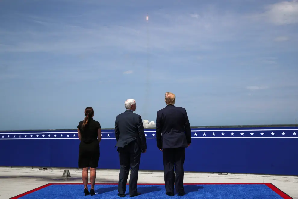 U.S. President Donald Trump, U.S. Vice President Mike Pence and his wife Karen Pence watch the launch of a SpaceX Falcon 9 rocket and Crew Dragon spacecraft, from Cape Canaveral
