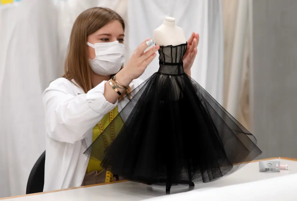A seamstress works at Dior workshop ahead of the Haute Couture Online Fall/Winter 2020/2021 collection presentation by designer Maria Grazia Chiuri for fashion house Dior in Paris, France, July 4, 2020. Picture taken July 4, 2020.  REUTERS/Charles Platiau [[[REUTERS VOCENTO]]] FASHION-PARIS/HAUTE COUTURE-DIOR