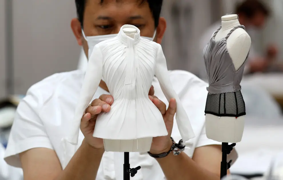 Creations by designer Maria Grazia Chiuri are displayed on miniature mannequins ahead of her Haute Couture Online Fall/Winter 2020/2021 collection presentation for fashion house Dior in Paris, France, July 4, 2020. Picture taken July 4, 2020. REUTERS/Charles Platiau [[[REUTERS VOCENTO]]] FASHION-PARIS/HAUTE COUTURE-DIOR