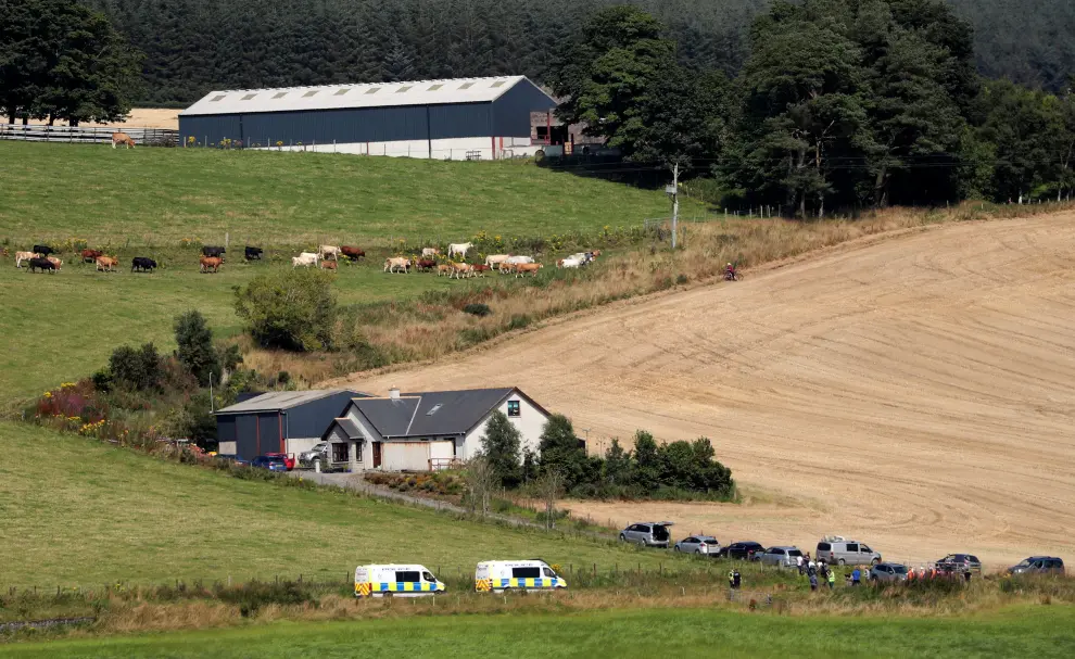 A rescue helicopter arrives at the scene of a derailed passenger train near Stonehaven in Scotland, Britain, August 12, 2020. REUTERS/Russell Cheyne [[[REUTERS VOCENTO]]] BRITAIN-RAIL/