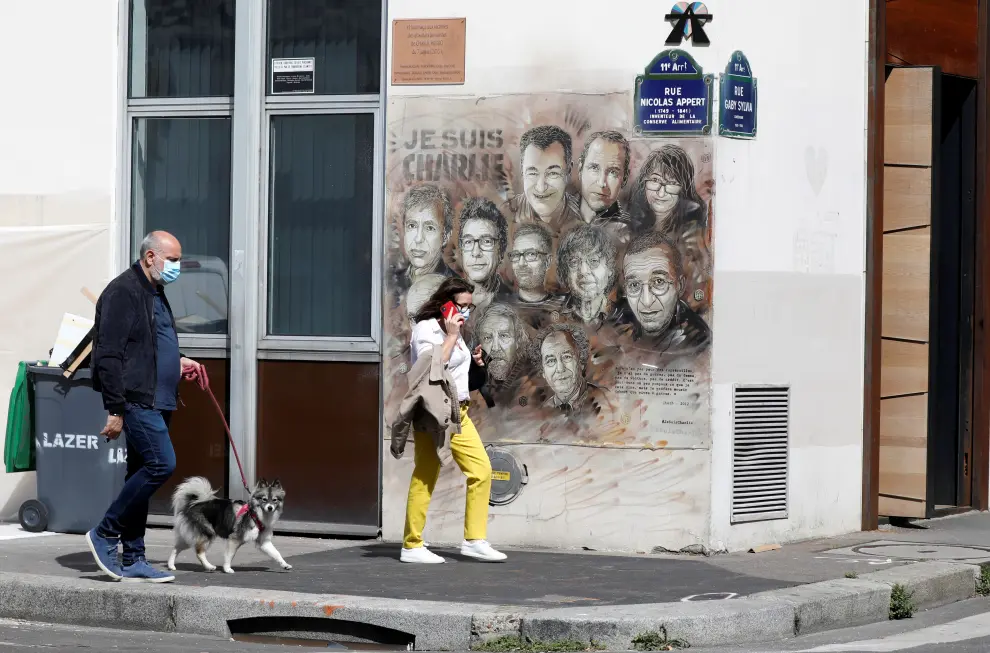 The artwork of French street artist Christian Guemy, also known as C215, is seen in memory of the late policewoman Clarissa Jean-Philippe in Montrouge as Paris court prepares for the opening of the trial of the January 2015 Paris attacks against Charlie Hebdo satirical weekly magazine, a policewoman in Montrouge and the Hyper Cacher kosher supermarket, France, August 31, 2020. Picture taken August 31, 2020. REUTERS/Charles Platiau  NO RESALES. NO ARCHIVES [[[REUTERS VOCENTO]]] FRANCE-CHARLIEHEBDO/TRIAL