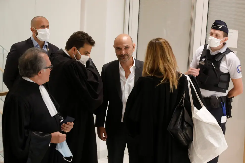 Richard Malka, a lawyer of Charlie Hebdo satirical weekly, talks to journalists in front of the courtroom for the opening of the trial of the January 2015 Paris attacks against Charlie Hebdo satirical weekly, a policewoman in Montrouge and the Hyper Cacher kosher supermarket, at Paris courthouse, France, Steptember 2, 2020. The trial will take place from September 2 to November 10. REUTERS/Charles Platiau [[[REUTERS VOCENTO]]] FRANCE-CHARLIEHEBDO/TRIAL