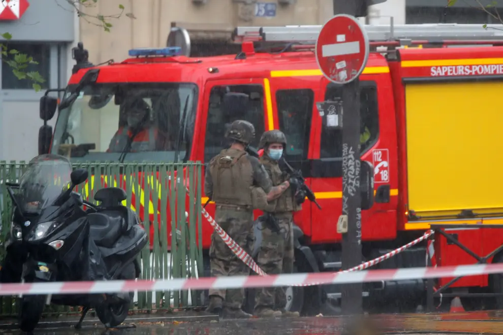 Emergency services seen at the scene of an incident near the former offices of French magazine Charlie Hebdo, in Paris, France September 25, 2020. REUTERS/Gonzalo Fuentes [[[REUTERS VOCENTO]]] FRANCE-SECURITY/PARIS