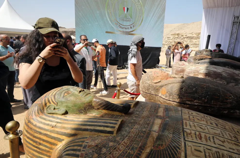 03 October 2020, Egypt, Giza: Mostafa Waziri, the secretary-general of the Supreme Council of Antiquities, inspects one of the newly discovered coloured ancient intact and sealed coffins, which uncovered by an Egyptian archaeological mission at Saqqara burial ground. Photo: Samer Abdallah/dpa03/10/2020 ONLY FOR USE IN SPAIN [[[EP]]] 03 October 2020, Egypt, Giza: Mostafa Waziri, the secretary-general of the Supreme Council of Antiquities, inspects one of the newly discovered coloured ancient intact and sealed coffins, which uncovered by an Egyptian archaeological mission at Saqqara bu
