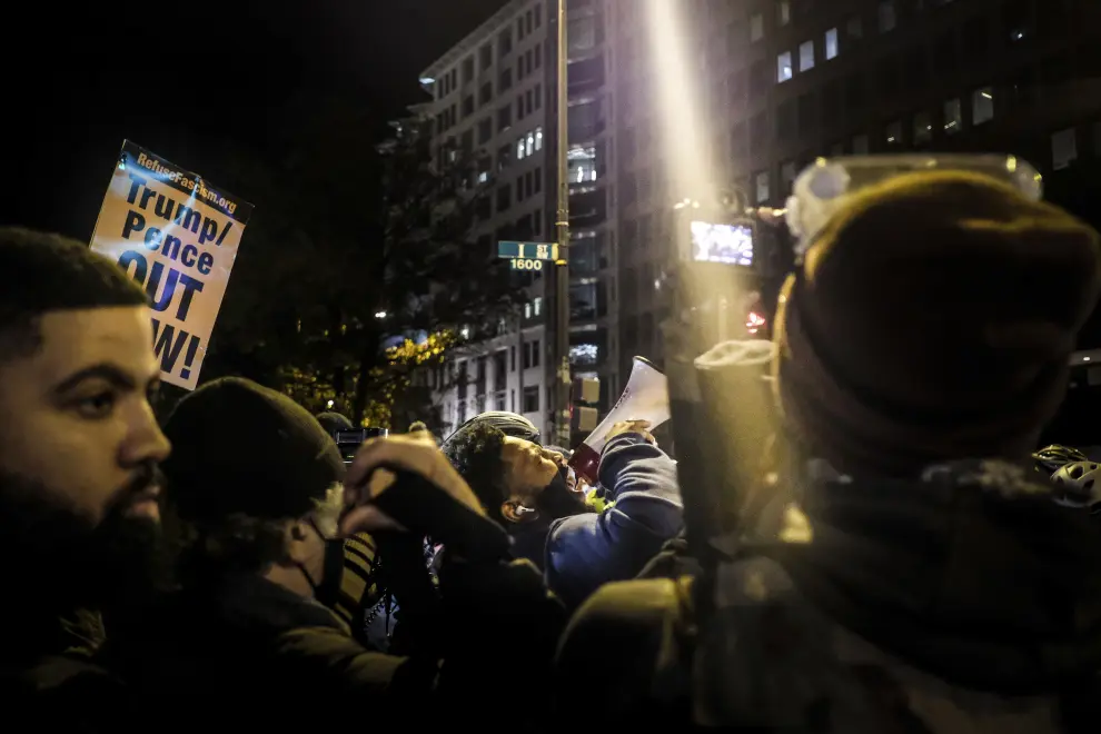 People protest outside the White House during election night