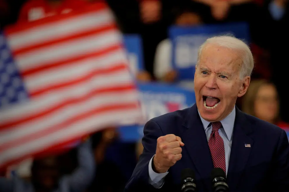 FILE PHOTO: Democratic U.S. presidential candidate and former Vice President Joe Biden gestures as he takes part in a campaign stop in St. Louis, Missouri, U.S., March 7, 2020. REUTERS/Brendan McDermid/File Photo [[[REUTERS VOCENTO]]] USA-ELECTION/BIDEN
