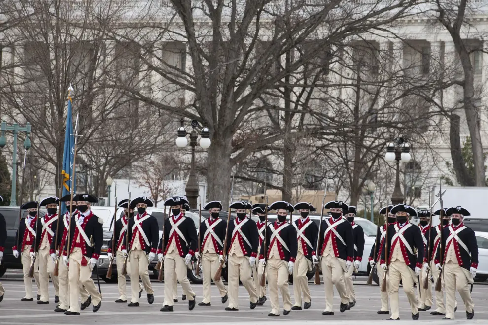 Washington (United States), 18/01/2021.- A military band passes the East Front of the US Capitol during the dress rehearsal in advance of the Inauguration of United States President-elect Joe Biden at the US Capitol in Washington, DC, USA, 18 January 2021. The Inauguration is scheduled for Wednesday, January 20, 2021. (Estados Unidos) EFE/EPA/ROD LAMKEY/ POOL Preparations ahead of Biden-Harris inaugration