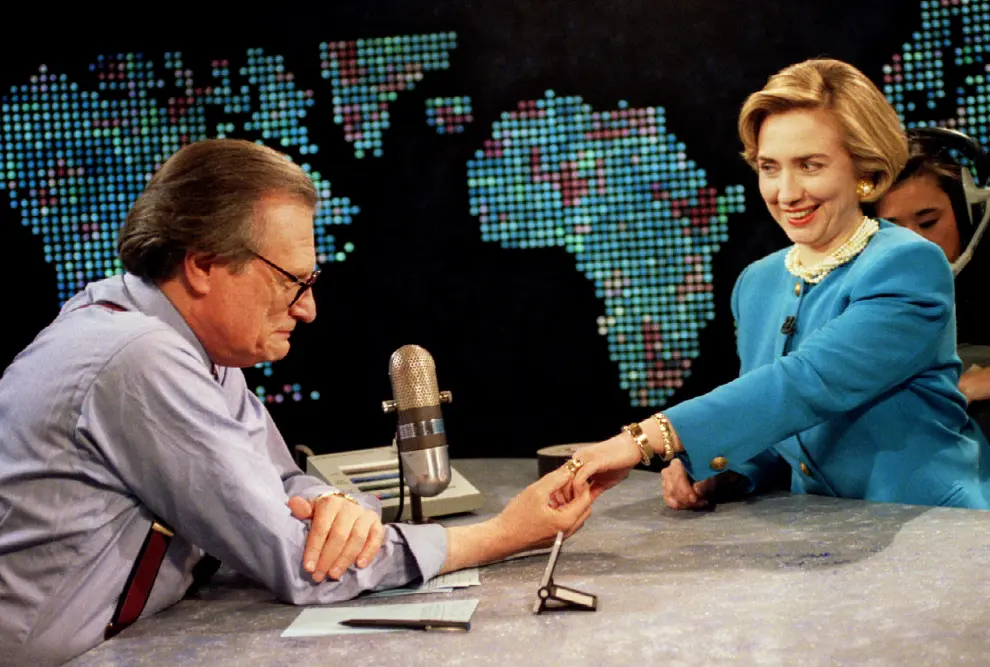 FILE PHOTO: Singer and actress Madonna (R) shares a laugh with Larry King on the set of the CNN talk show Larry PEOPLE-LARRY KING/