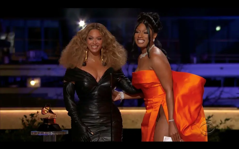 Megan Thee Stallion and Beyonce win the Grammy for Best Rap Performance for Savage in this screen grab taken from video of the 63rd Annual Grammy Awards in Los Angeles, California, U.S., March 14, 2021. CBS/Handout via REUTERS - ATTENTION EDITORS - THIS IMAGE HAS BEEN SUPPLIED BY A THIRD PARTY. NO ARCHIVES, NO SALES, MANDATORY CREDIT, NO NEW USES AFTER 0400 GMT 17/3/2021, NO BROADCAST USE, USE FOR GRAMMY RELATED COVERAGE ONLY[[[REUTERS VOCENTO]]] AWARDS-GRAMMYS/