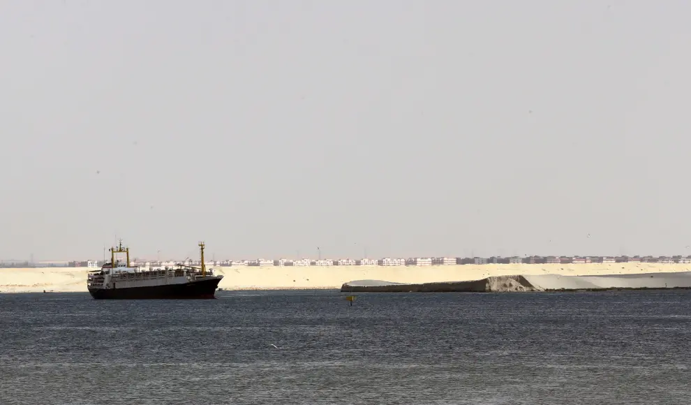 Suez Canal blocked as container ship runs aground