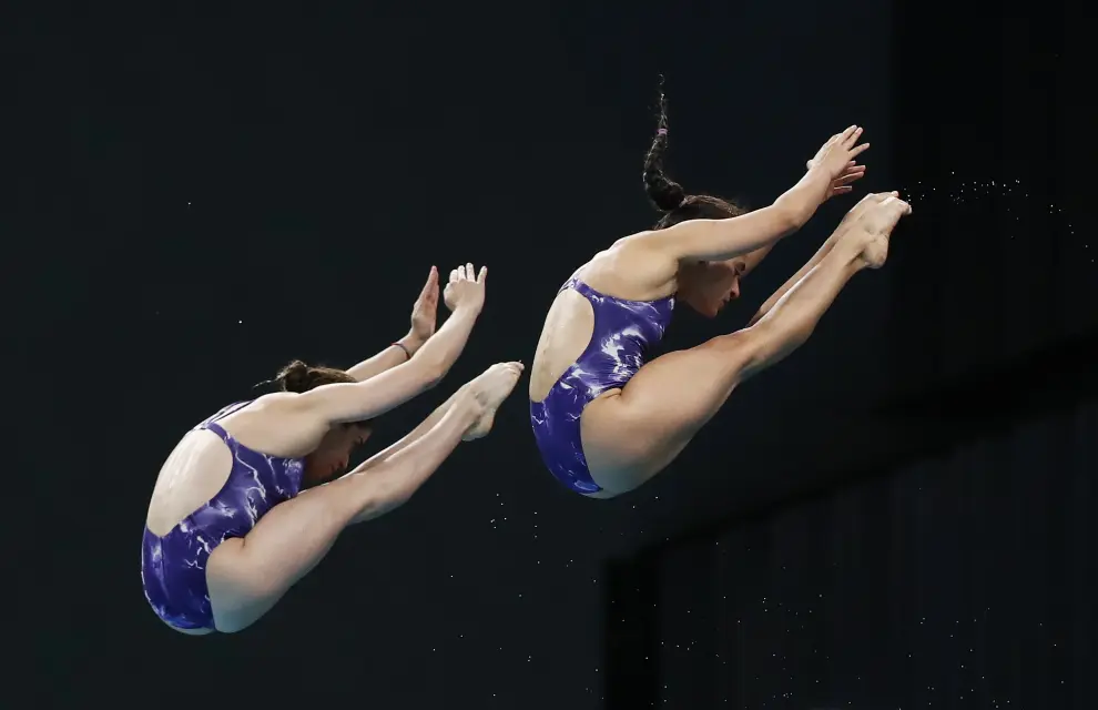 Diving - FINA Diving World Cup 2021 and Tokyo 2020 Olympics Aquatics Test Event - Tokyo Aquatics Centre, Tokyo, Japan - May 2, 2021 Russian Federation's Ekaterina Beliaeva and Yulia Timoshinina in action during the women's synchronised 10m platform final REUTERS/Issei Kato[[[REUTERS VOCENTO]]] OLYMPICS-2020/TEST-AQUATICS