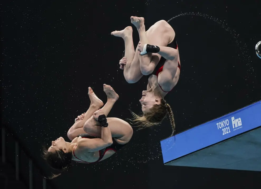 Diving - FINA Diving World Cup 2021 and Tokyo 2020 Olympics Aquatics Test Event - Tokyo Aquatics Centre, Tokyo, Japan - May 2, 2021 Poland's Andrzej Rzeszutek and Kacper Lesiak in action during the men's synchronised 3m springboard final REUTERS/Issei Kato[[[REUTERS VOCENTO]]] OLYMPICS-2020/TEST-AQUATICS
