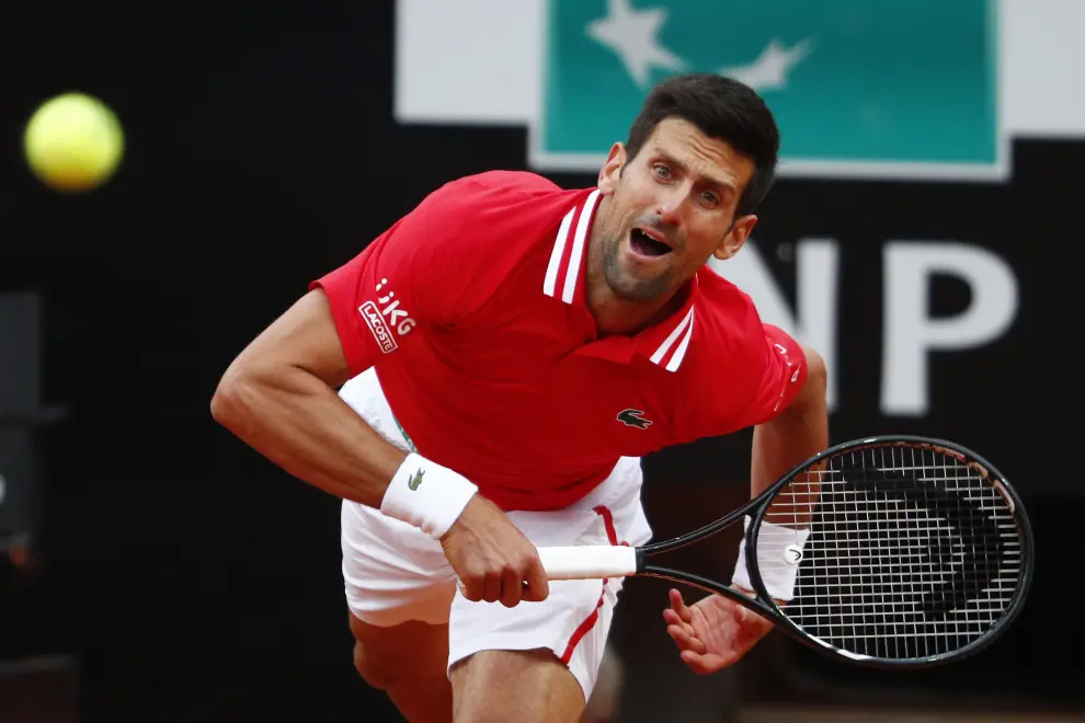 Tennis - ATP Masters 1000 - Italian Open - Foro Italico, Rome, Italy - May 16, 2021 Serbias Novak Djokovic in action during his final match against Spains Rafael Nadal REUTERS/Guglielmo Mangiapane[[[REUTERS VOCENTO]]] TENNIS-ROME/