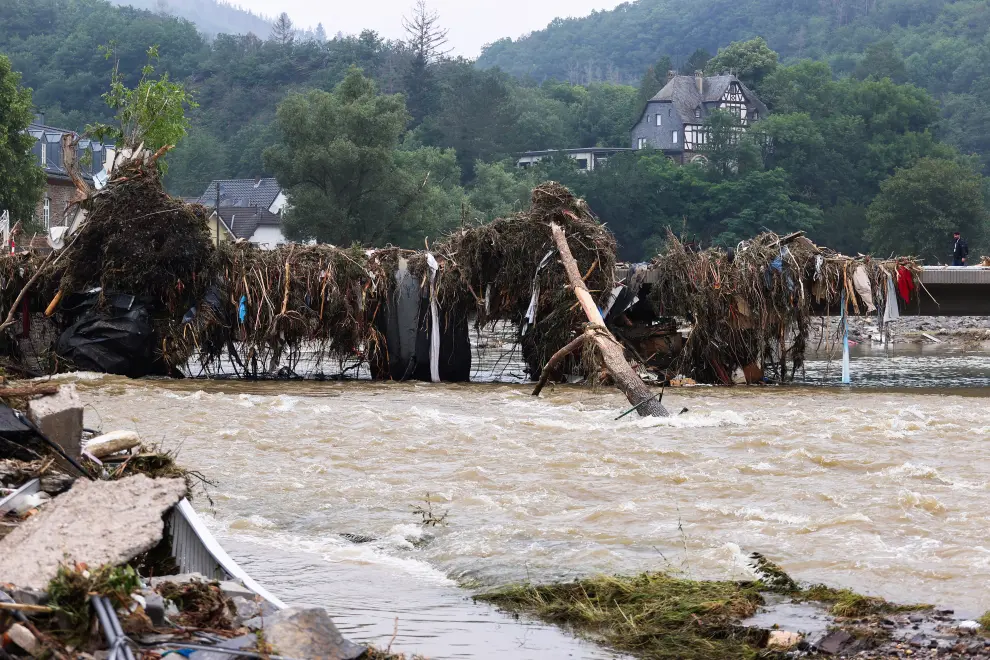 A view of broken trees and debris with the Kreuzberg Castle seen in the background following heavy rainfalls in Kreuzberg, Germany, July 17, 2021. REUTERS/Wolfgang Rattay[[[REUTERS VOCENTO]]] EUROPE-WEATHER/GERMANY