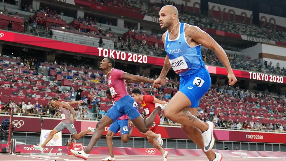 Tokyo 2020 Olympics - Athletics - Mens 100m - Final - OLS - Olympic Stadium, Tokyo, Japan - August 1, 2021. Lamont Marcell Jacobs of Italy crosses the line to win gold REUTERS/Pawel Kopczynski[[[REUTERS VOCENTO]]] OLYMPICS-2020-ATH/M-100M-FNL
