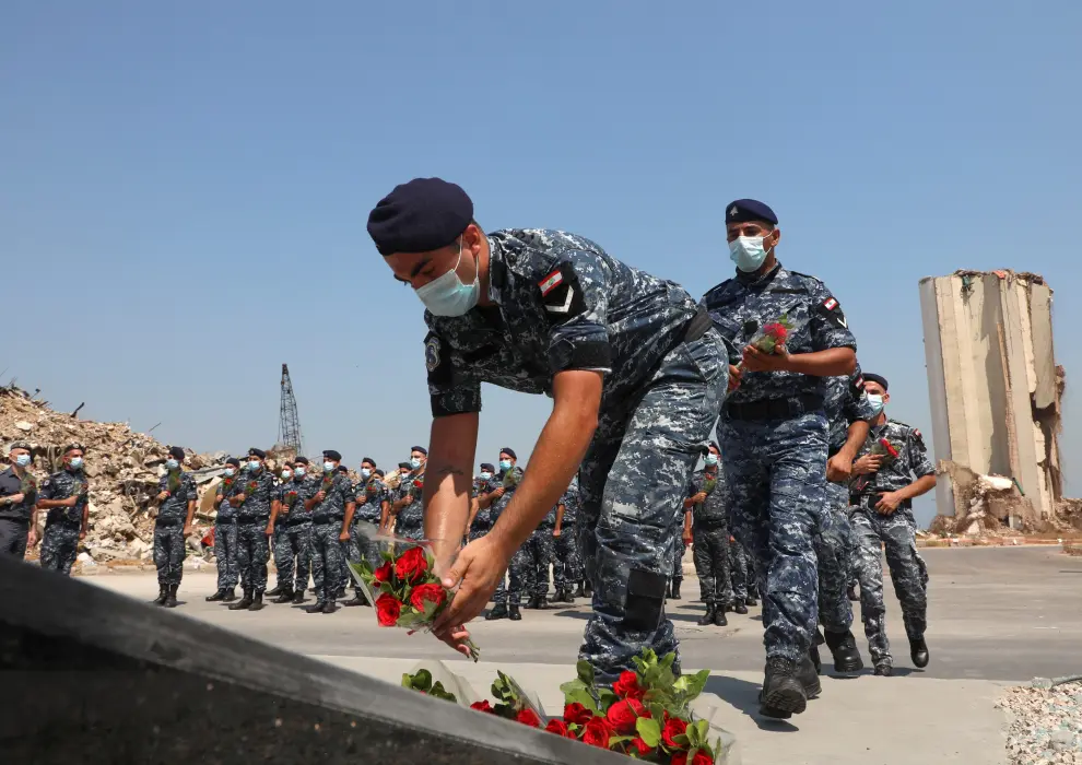 Members of internal security forces pay tribute to the victims of last years Beirut port marking one-year anniversary of the port explosion, at Port of Beirut, Lebanon August 4, 2021. REUTERS/Mohamed Azakir[[[REUTERS VOCENTO]]] LEBANON-BLAST/ANNIVERSARY