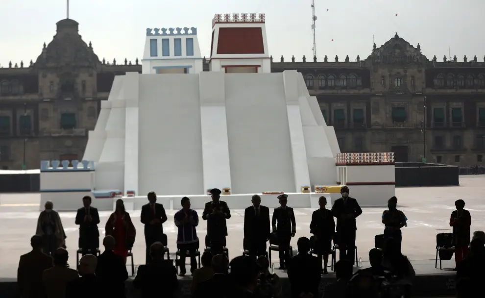 People attend the projection of a short film called Memoria Luminosa on a replica of the Templo Mayor, the Aztec civilisations most sacred site, to mark the 500th Anniversary of the Fall of Tenochtitlan, at the Zocalo square in downtown Mexico City, Mexico August 13, 2021. REUTERS/Gustavo Graf[[[REUTERS VOCENTO]]] MEXICO-ANNIVERSARY/