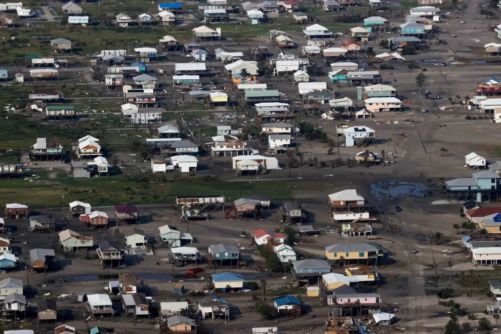 A view shows debris and buildings damaged from Hurricane Ida during U.S. President Joe Biden's aerial tour of communities in Laffite, Grand Isle, Port Fourchon