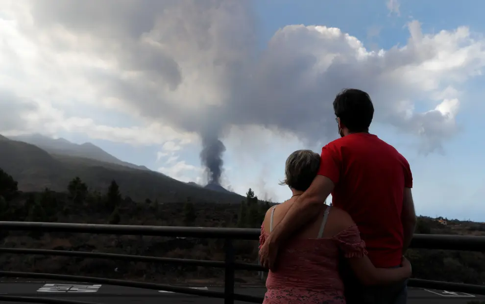 Smoke rises from the main and a newly created crater following the eruption of a volcano on the Canary Island of La Palma, in El Paso, Spain, September 25, 2021. REUTERS/Jon Nazca[[[REUTERS VOCENTO]]] SPAIN- VOLCANO/