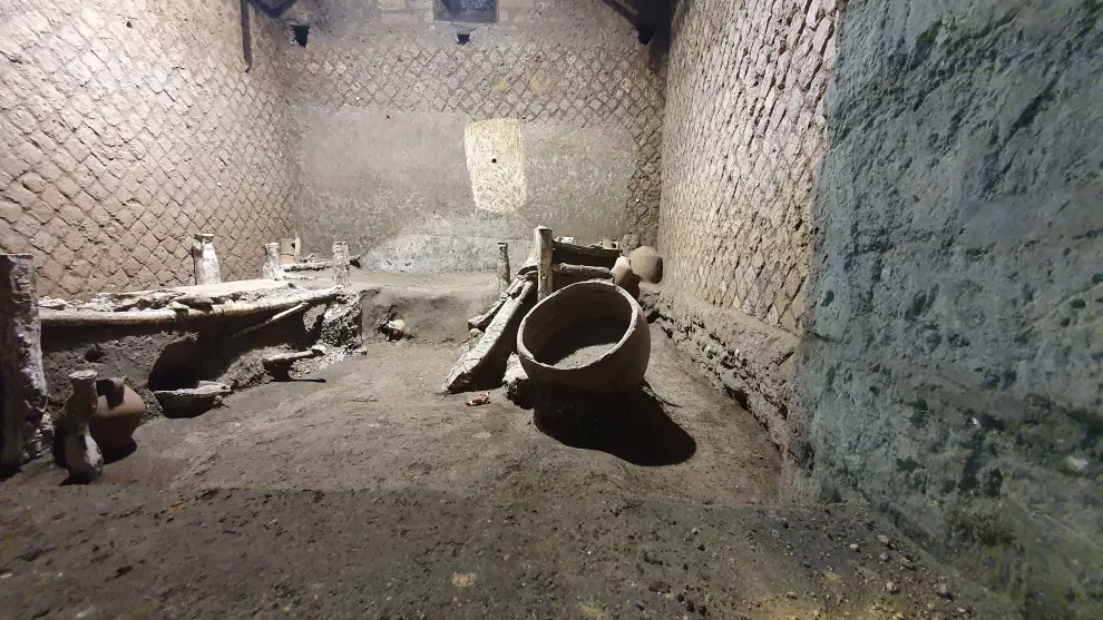 A slaves room at a Roman villa, containing beds, amphorae, ceramic pitchers and a chamber pot is discovered in a dig near the ancient Roman city of Pompeii, destroyed in 79 AD in volcanic eruption, Italy, 2021. Pompeii Archeological Park/Ministry of Cultural Heritage and Activities and Tourism/Handout via REUTERS THIS IMAGE HAS BEEN SUPPLIED BY A THIRD PARTY. NO ARCHIVE, NO RESALE[[[REUTERS VOCENTO]]] ITALY-POMPEII/