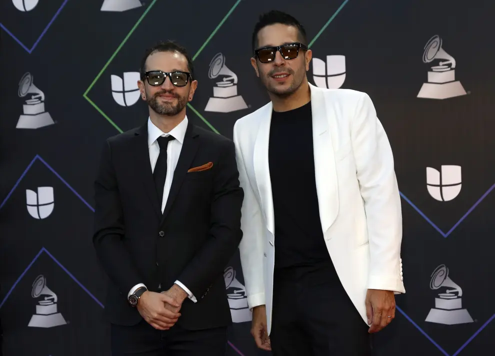 Las Vegas (United States), 19/11/2021.- Cuban producer Nelson Albareda (L) and Edgar Martinez arrive on the red carpet during the 22nd annual Latin Grammy Awards ceremony at the MGM Grand Garden Arena in Las Vegas, Nevada, USA, 18 November 2021. The Latin Grammys recognize artistic and/or technical achievement, not sales figures or chart positions, and the winners are determined by the votes of their peers - the qualified voting members of the Latin Recording Academy. (Estados Unidos) EFE/EPA/NINA PROMMER
 USA LATIN GRAMMYS 2021