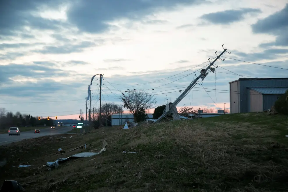 Emergency workers gather after a tornado hit Bowling Green, Kentucky, U.S., December 11, 2021 in this picture obtained from social media. Lindsey Nance/via REUTERS THIS IMAGE HAS BEEN SUPPLIED BY A THIRD PARTY. MANDATORY CREDIT. USA-WEATHER/TORNADO-KENTUCKY-UGC