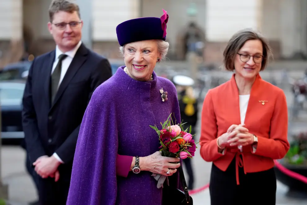Copenhagen (Denmark), 14/01/2022.- Queen Margrethe II (L) of Denmark is greeted by Prime Minister Mette Frederiksen (R) at the Danish Parliament's celebration of the Queen Margrethe 50th Regent's Anniversary at Christiansborg Caste, in Copenhagen, Denmark, 14 January 2022. Queen Margrethe II acceded Denmark's throne in 1972. The country marks the accession anniversary with low-key celebrations due to the coronavirus pandemic, public celebrations have been delayed to later in September 2022. (Abierto, Dinamarca, Copenhague) EFE/EPA/Mads Claus Rasmussen DENMARK OUT
 DENMARK ROYALTY THRONE JUBILEE