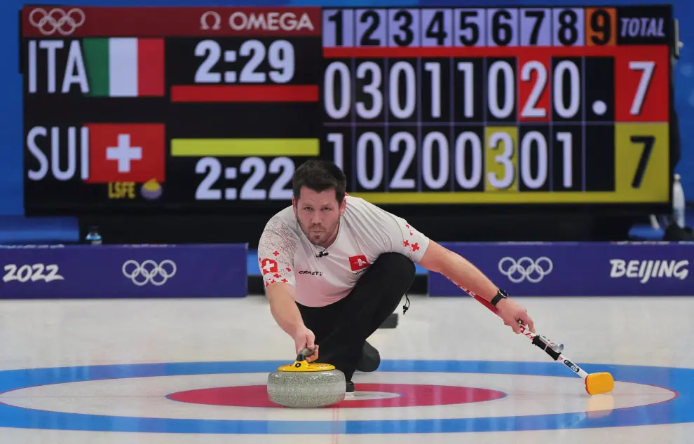 2022 Beijing Olympics - Curling - Mixed Doubles Round Robin Session 3 - Italy v Switzerland - National Aquatics Center, Beijing, China - February 3, 2022. Martin Rios of Switzerland in action. REUTERS/Eloisa Lopez OLYMPICS-2022-CURLING/