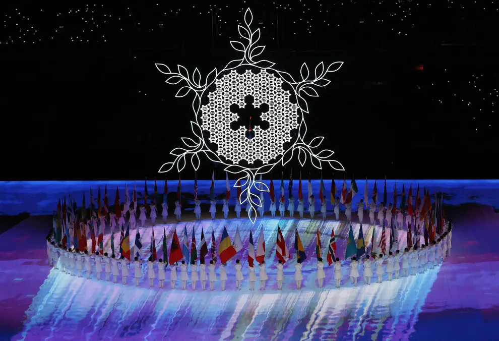 2022 Beijing Olympics - Closing Ceremony - National Stadium, Beijing, China - February 20, 2022. Fireworks explode above the stadium as performers, a snowflake and the Olympic rings are seen during the closing ceremony. REUTERS/David W Cerny OLYMPICS-2022-CLOSING/