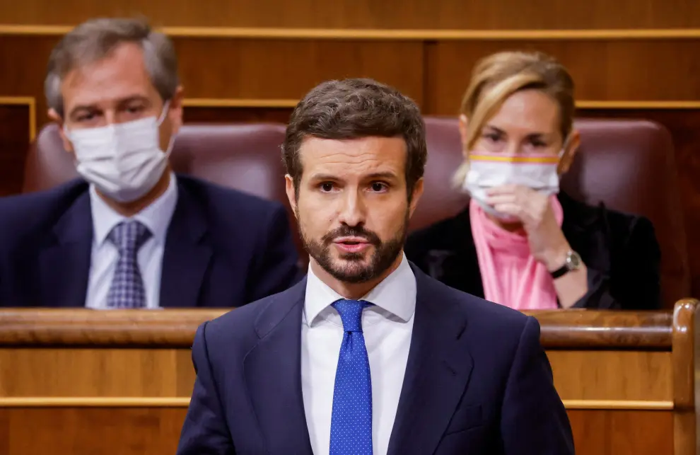 Pablo Casado, leader of Popular Party (PP) is applauded during a session at the Parliament, in Madrid, Spain, Februray 23, 2022. REUTERS/Juan Medina SPAIN-POLITICS/OPPOSITION
