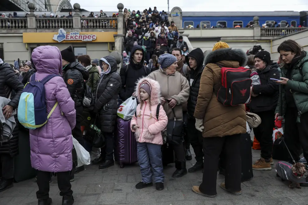 Displaced Ukrainians arrive at the Lviv train station in western Ukraine