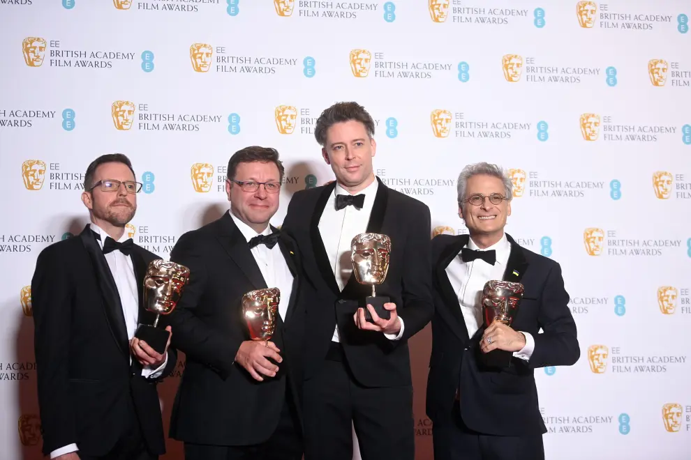 London (United Kingdom), 13/03/2022.- (L-R) Robert Fyvolent, David Dinerstein, Ahmir Khalib Thompson aka Questlove and Joseph Patel pose with their awards for Best Documentary for 'Summer of Soul (or, When the Revolution Could Not be Televised) in the press room during the 75th BAFTA Film Awards at the Royal Albert Hall in London, Britain, 13 March 2022. The ceremony is hosted by the British Academy of Film and Television Arts (BAFTA). (Reino Unido, Londres) EFE/EPA/NEIL HALL BRITAIN BAFTA AWARDS 2022