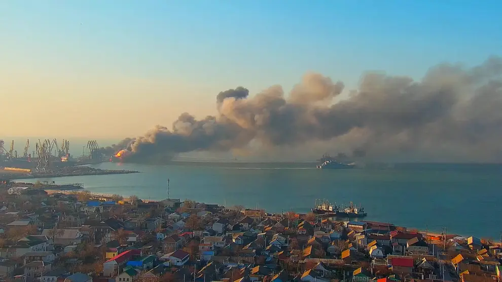 Smoke billows from a fire on what Ukrainian Ministry of Defence says is a Russian ship, as Russia's invasion of Ukraine continues, at the port of Berdiansk, Ukraine, March 24, 2022 in this still image obtained from a social media video. Kirillovka.ks.ua/Handout via REUTERS  ATTENTION EDITORS - THIS IMAGE HAS BEEN SUPPLIED BY A THIRD PARTY. NO RESALES. NO ARCHIVES. MANDATORY CREDIT. UKRAINE-CRISIS/BERDIANSK-PORT