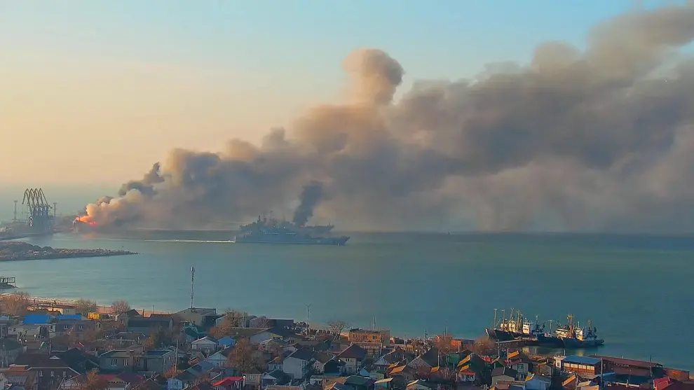 Smoke billows from a fire on what Ukrainian Ministry of Defence says is a Russian ship, as Russia's invasion of Ukraine continues, at the port of Berdiansk, Ukraine, March 24, 2022 in this still image obtained from a social media video. Kirillovka.ks.ua/Handout via REUTERS  ATTENTION EDITORS - THIS IMAGE HAS BEEN SUPPLIED BY A THIRD PARTY. NO RESALES. NO ARCHIVES. MANDATORY CREDIT. UKRAINE-CRISIS/BERDIANSK-PORT