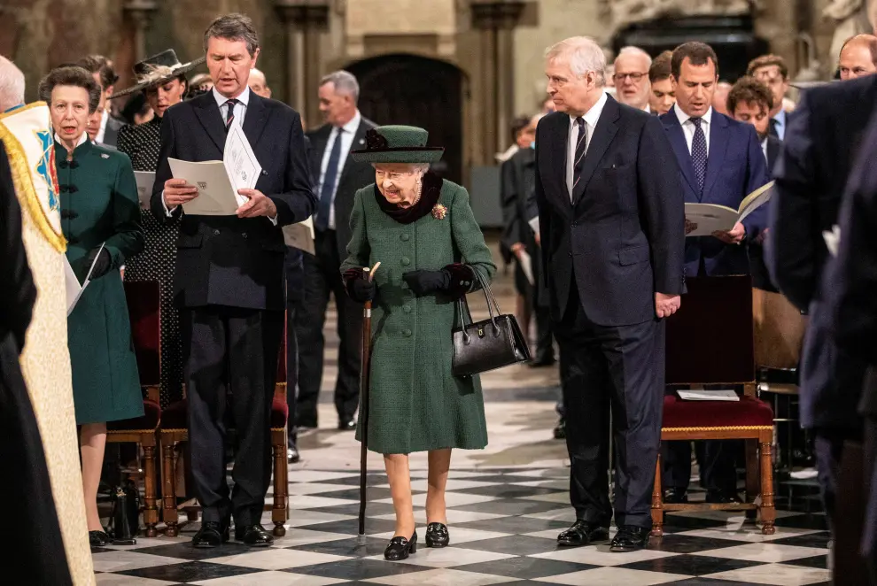 Britain's Queen Elizabeth, accompanied by Prince Andrew, Duke of York, attends a service of thanksgiving for late Prince Philip, Duke of Edinburgh, at Westminster Abbey in London, Britain, March 29, 2022. Richard Pohle/Pool via REUTERS BRITAIN-ROYALS/PHILIP-MEMORIAL