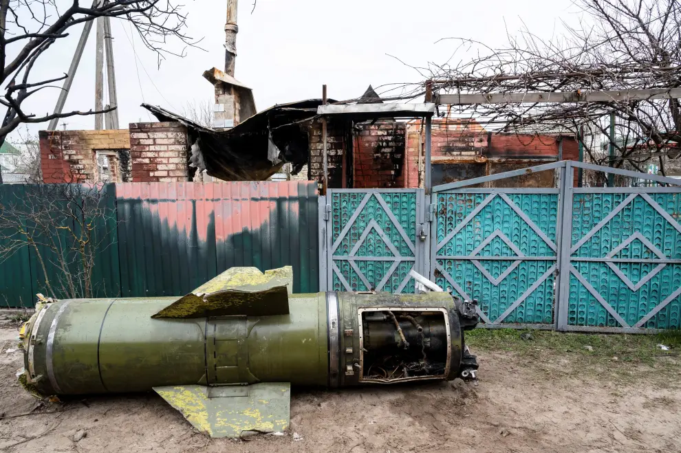 A person looks at the remains of a Russian missile, as Russia's invasion of Ukraine continues, in the village of Kozarovychi, near Kyiv, Ukraine, April 22, 2022. REUTERS/Viacheslav Ratynskyi UKRAINE-CRISIS/