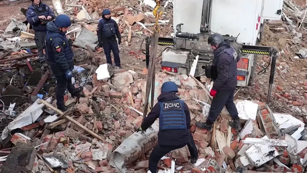 State Emergency Service (SES) experts remove Russian bombs as they clear the area as Russia's attack on Ukraine continues, in Chernihiv, Ukraine in this still image taken from a video April 21, 2022. Video taken April 21, 2022. State Emergency Service of Ukraine/Handout via REUTERS    THIS IMAGE HAS BEEN SUPPLIED BY A THIRD PARTY. UKRAINE-CRISIS/CHERNIHIV
