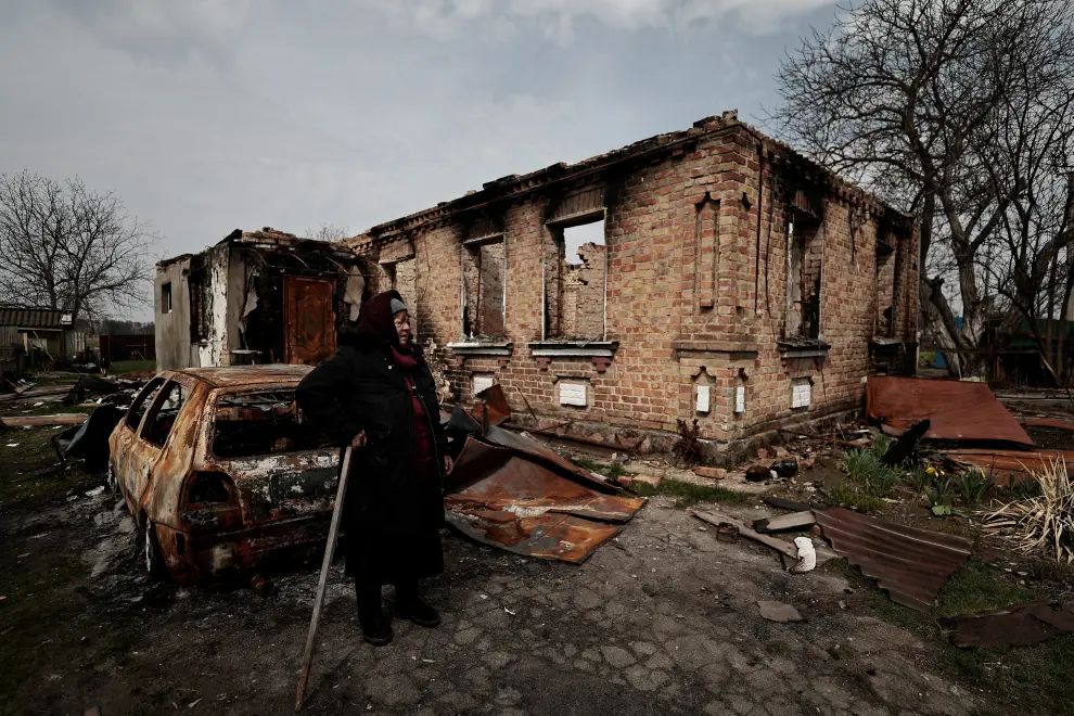 Ludmila Sadlova, 72, stands in her house's yard, that according to her was hit by rockets on March 12, amid Russia's invasion of Ukraine, in Ozera, Kyiv region, Ukraine April 23, 2022. REUTERS/Zohra Bensemra UKRAINE-CRISIS/