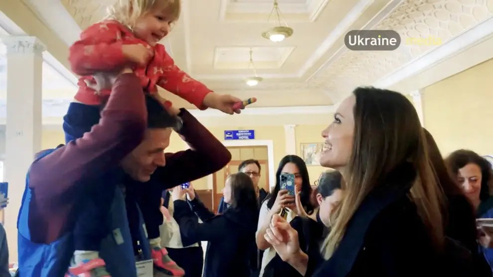 U.S. actor and UNHCR Special Envoy Angelina Jolie walks inside the main railway station during her visit to Lviv, amid Russia's ongoing invasion of Ukraine, in Lviv, Ukraine April 30, 2022 in this still image obtained from a social media video. Video recorded April 30, 2022. Lviv.Media via REUTERS ATTENTION EDITORS - THIS IMAGE HAS BEEN PROVIDED BY A THIRD PARTY. MANDATORY CREDIT. NO RESALES. NO ARCHIVES. UKRAINE-CRISIS/LVIV-JOLIE