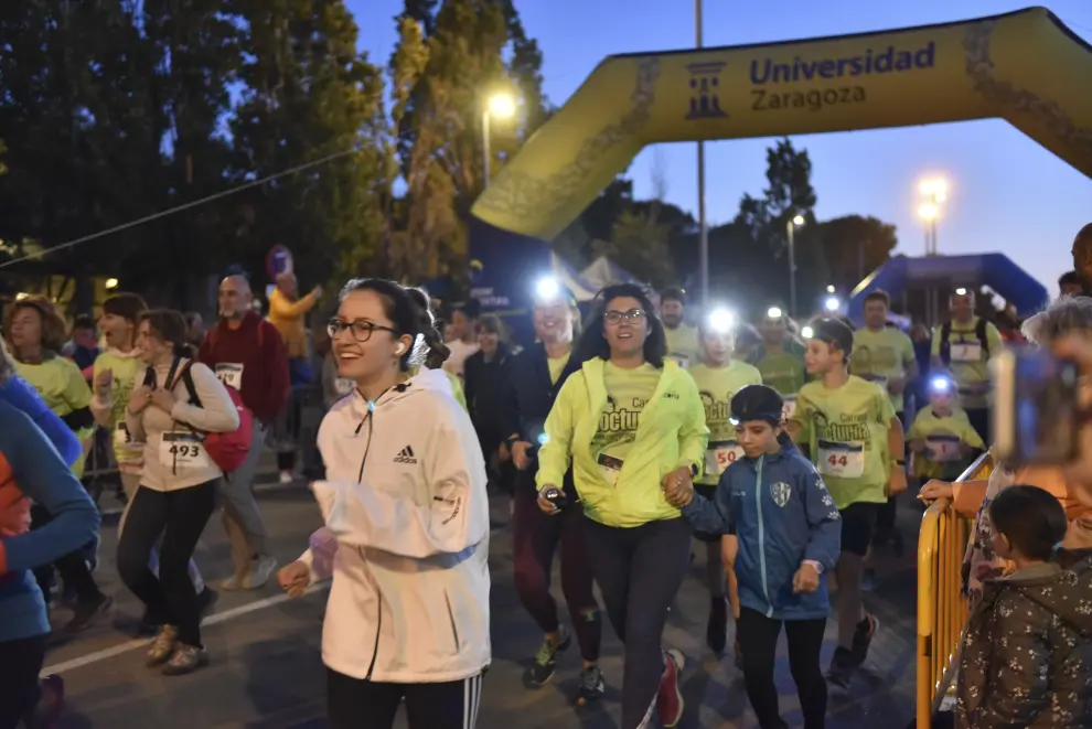 La carrera nocturna de Huesca reúne a más de 600 ‘iluminados’